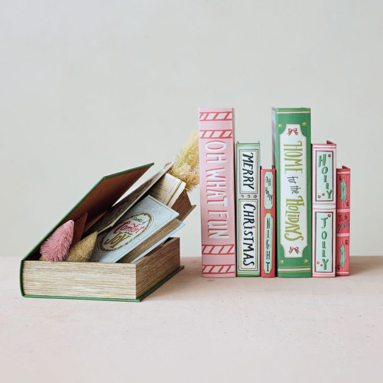 Set of three festive MDF and canvas book storage boxes with holiday-themed titles and designs.