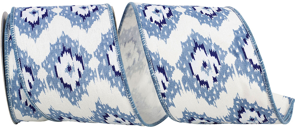 4 inch wide white canvas ribbon with a blue ikat pattern and wired edges.