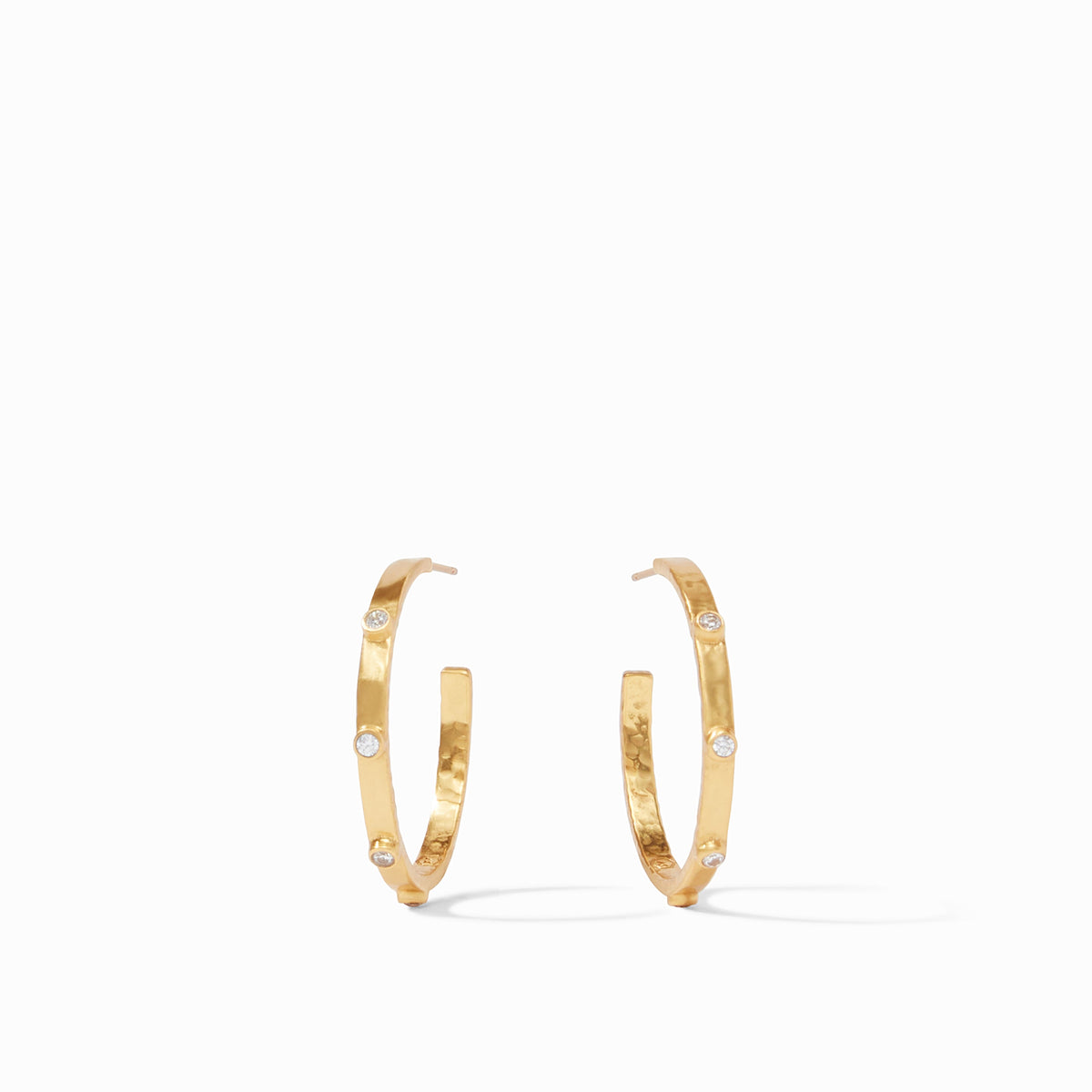 Lightly hammered gold hoop earring with gemstone accents