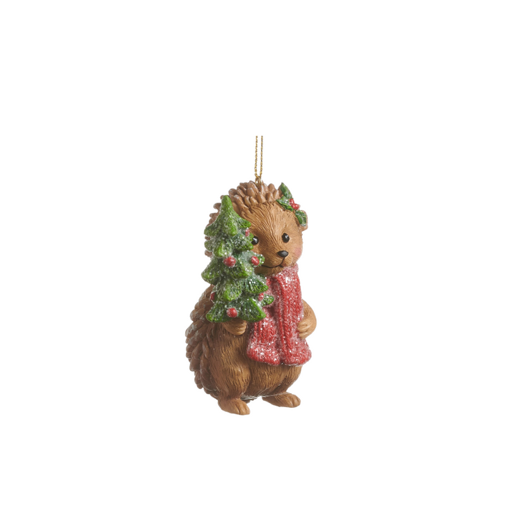 3.5-inch hedgehog Christmas ornament wearing a red scarf and holding a small green tree.
