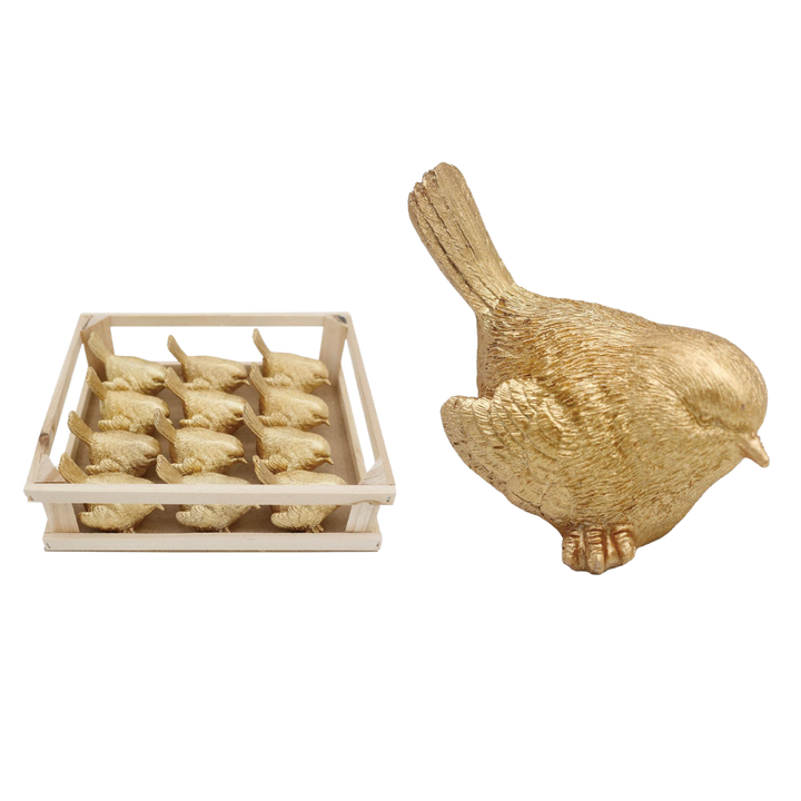 Mini resin bird figurine in gold finish with a naturalistic silhouette.