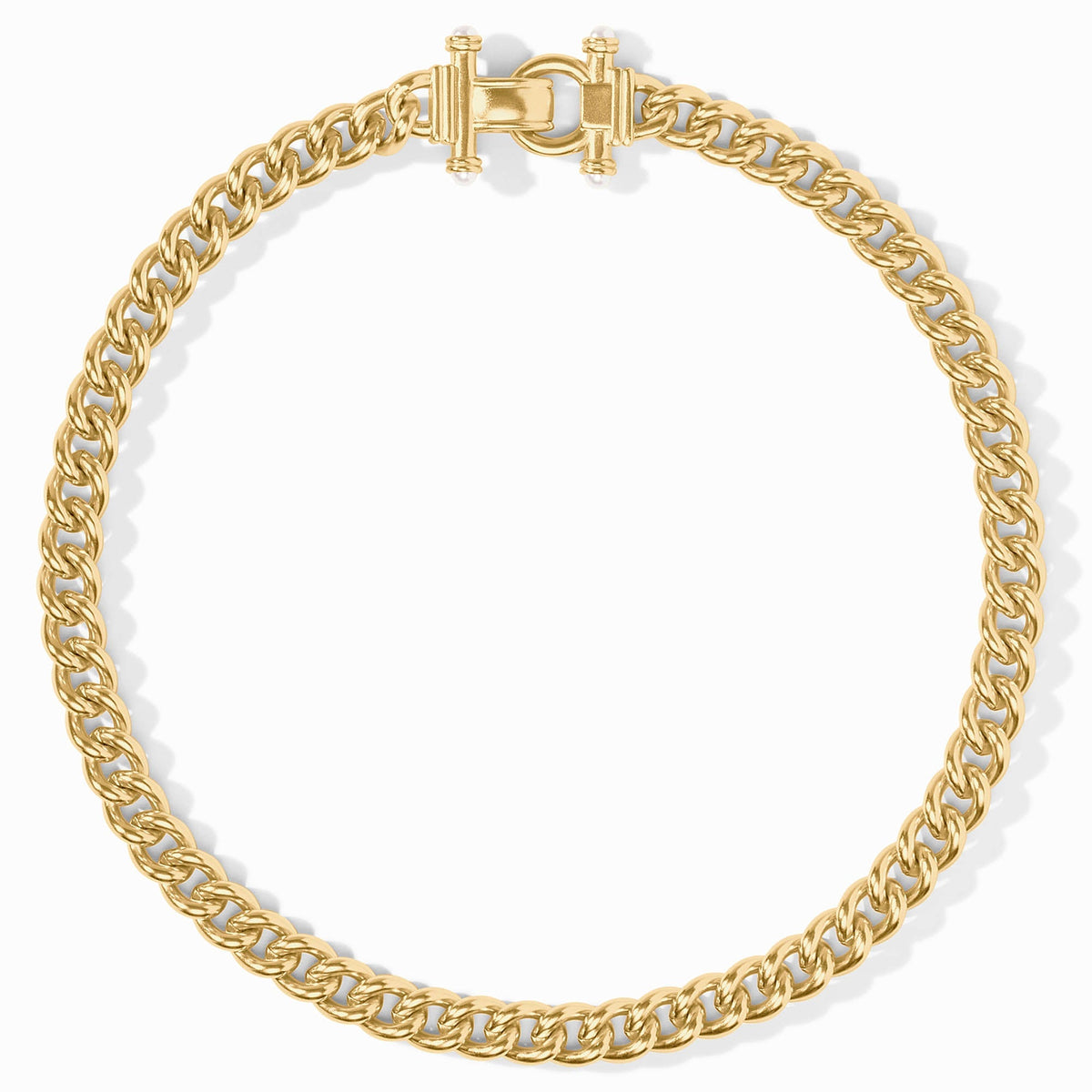 Gold-plated 18-inch curb link necklace with a fold-over clasp and glass pearl accents.