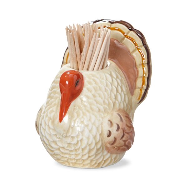 Ceramic turkey toothpick holder with wooden toothpicks inside.