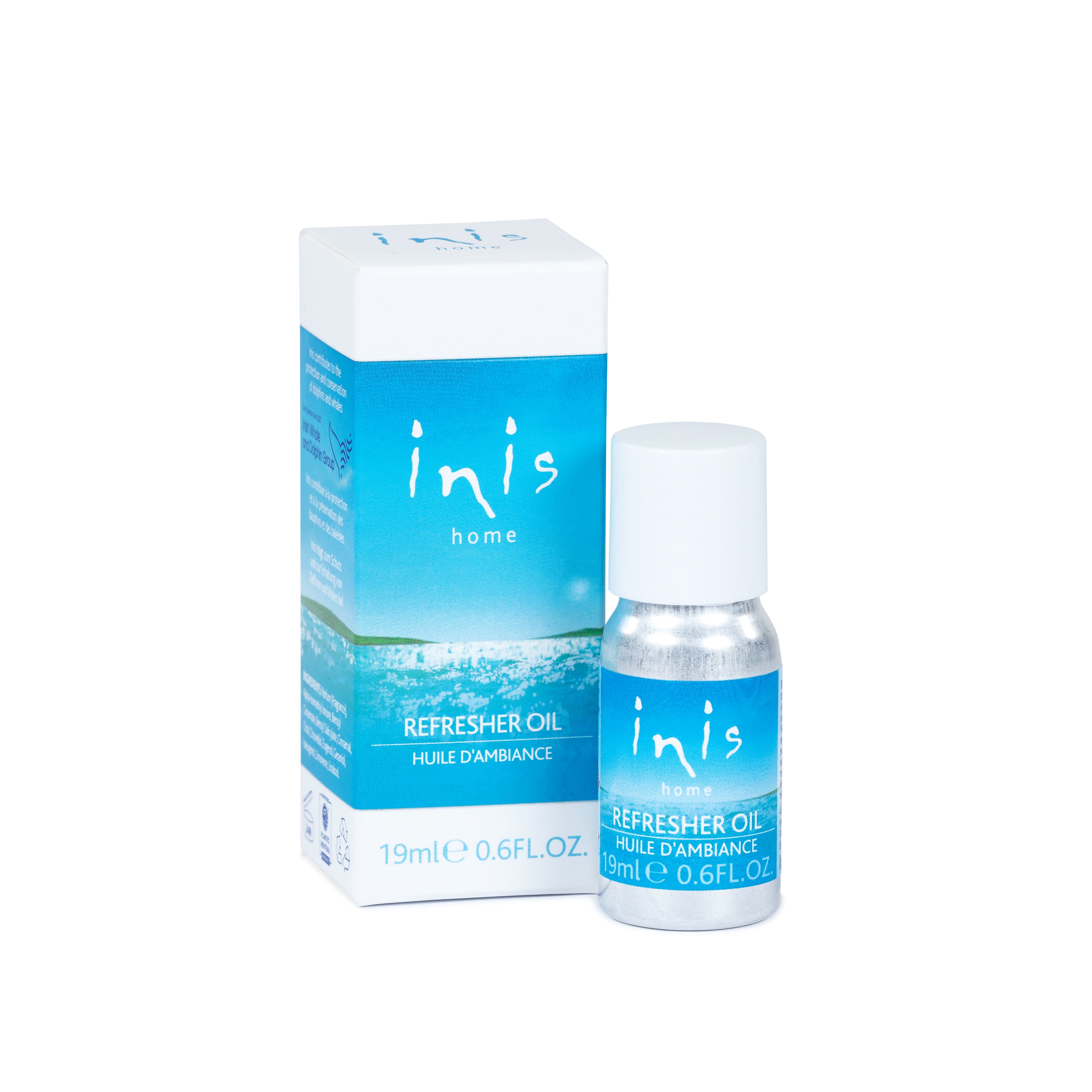 Bottle of Inis Energy Of The Sea home fragrance refresher oil in a clear glass container with white liquid.