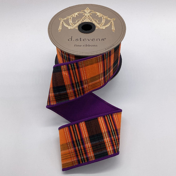 2.5 inch Salem plaid ribbon in orange, black, and purple with gold lurex on a d.stevens spool.