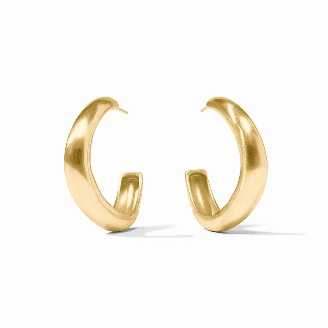 Medium size Wave Hoop earring in gold with undulating wave shape.