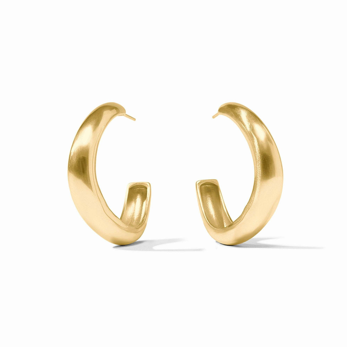 Medium size Wave Hoop earring in gold with undulating wave shape.