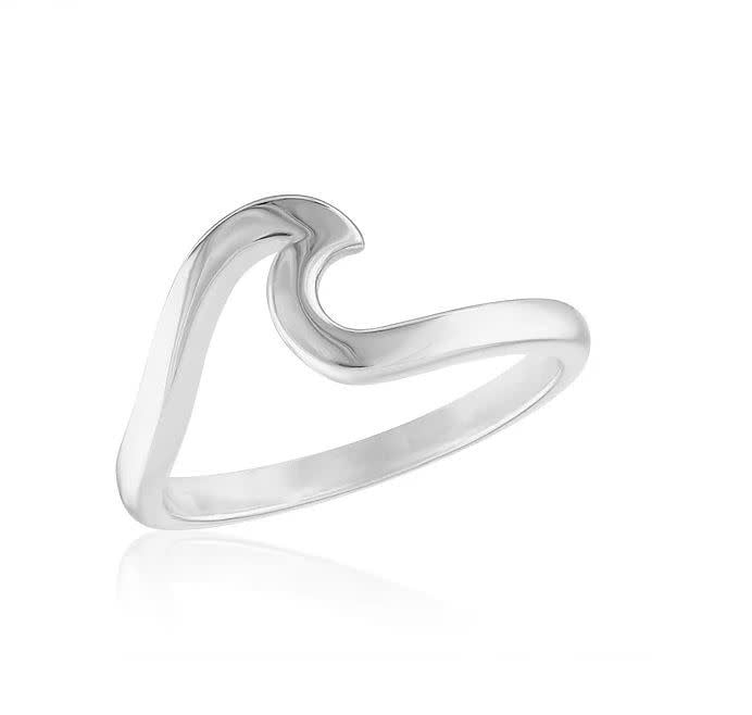 Silver wave stack ring with a sleek modern silhouette featuring an undulating pattern.
