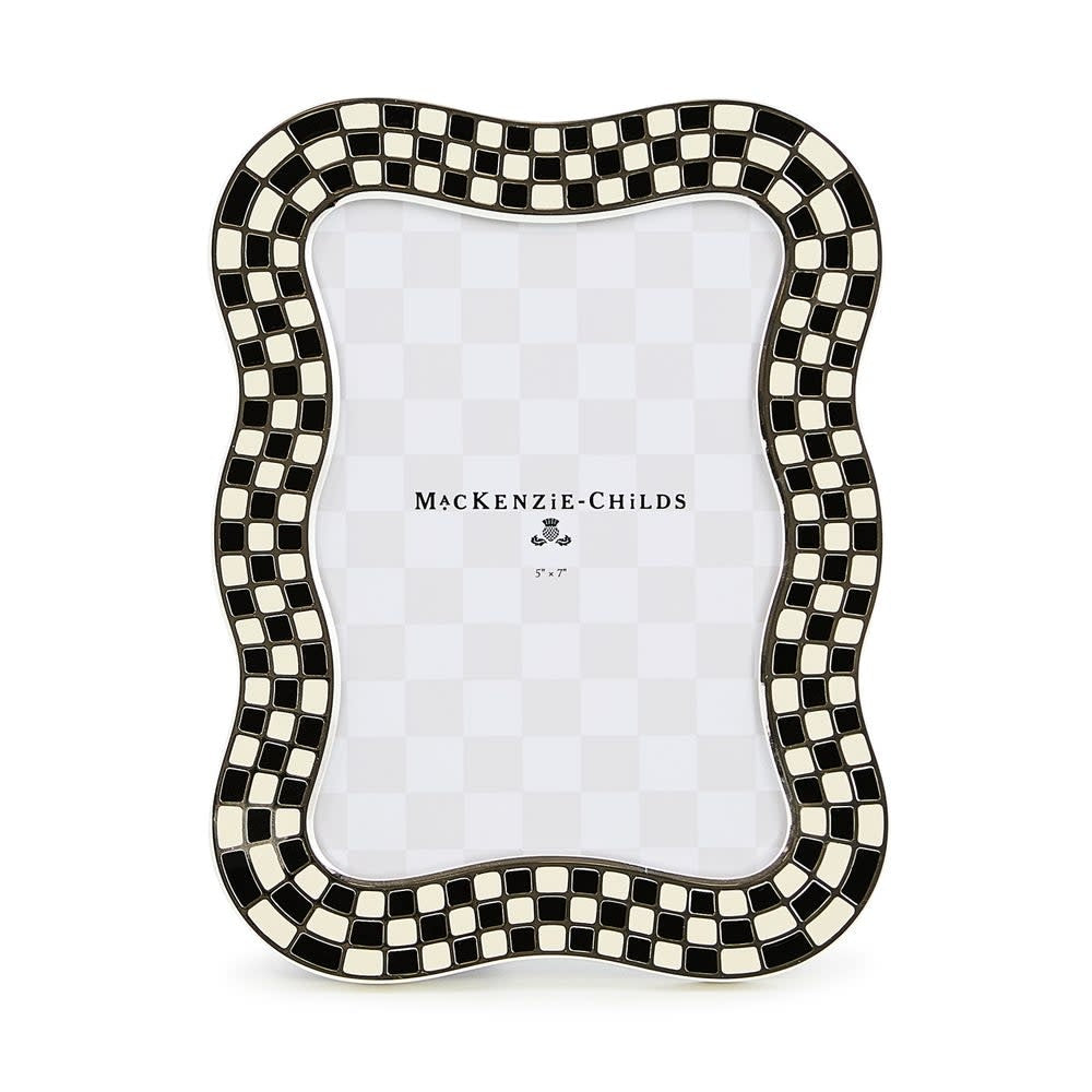 Silver-plated frame with wavy enamel check pattern, glass insert, velvet backing, and easel stand.