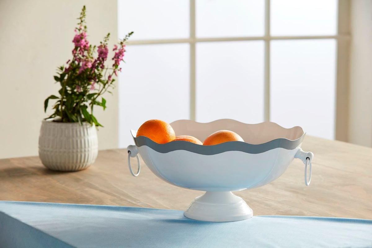 Hand-painted metal pedestal bowl with wavy edge and side ring handles.