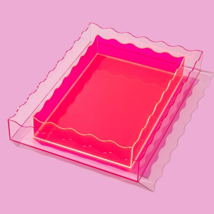 Large wavy acrylic tray in hot pink with a rectangular silhouette.