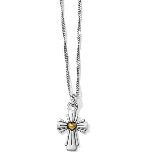 Silver-gold two-tone crystal cross necklace on adjustable chain with lobster claw closure.