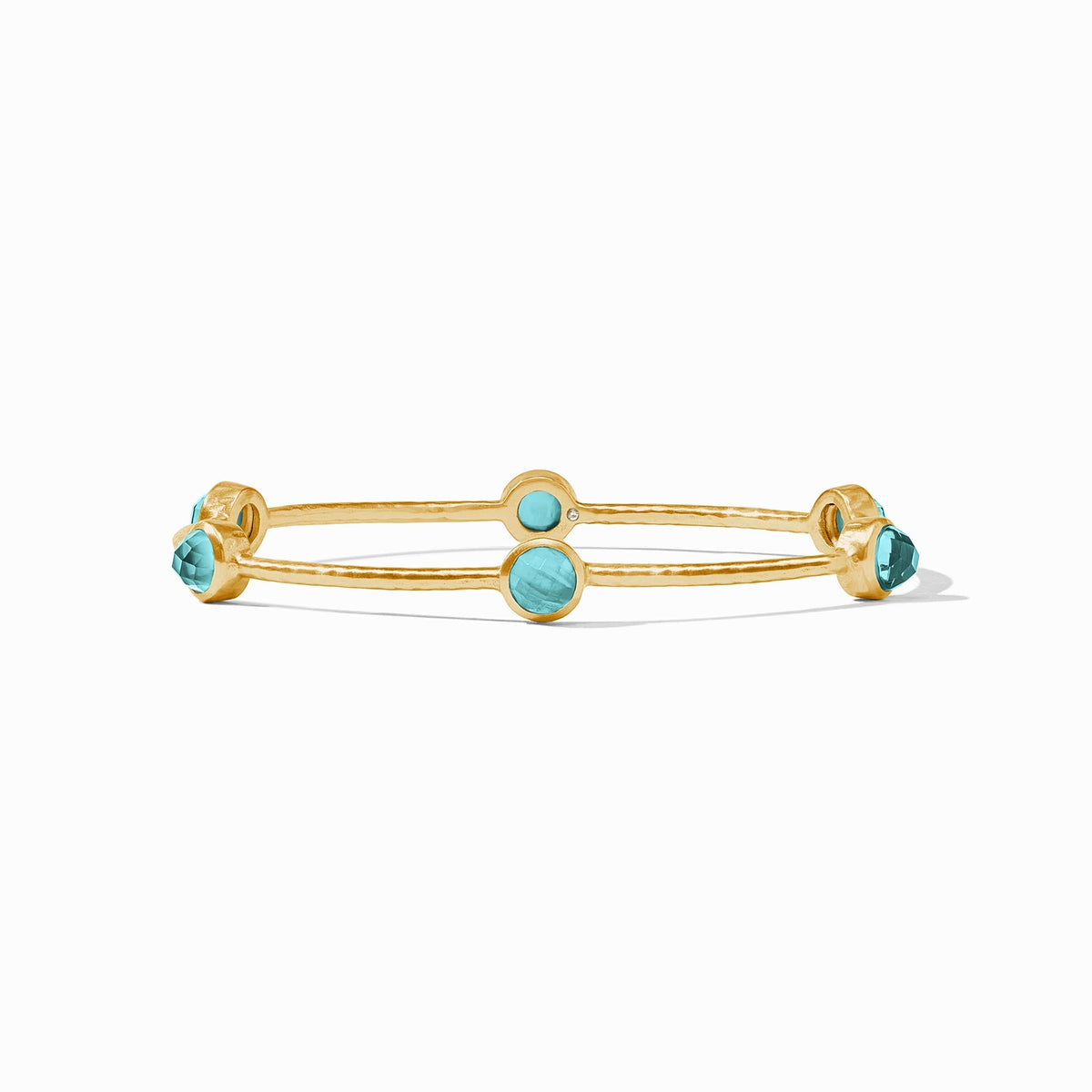 Milano Luxe Bangle in hammered gold with six round iridescent blue gemstone stations.