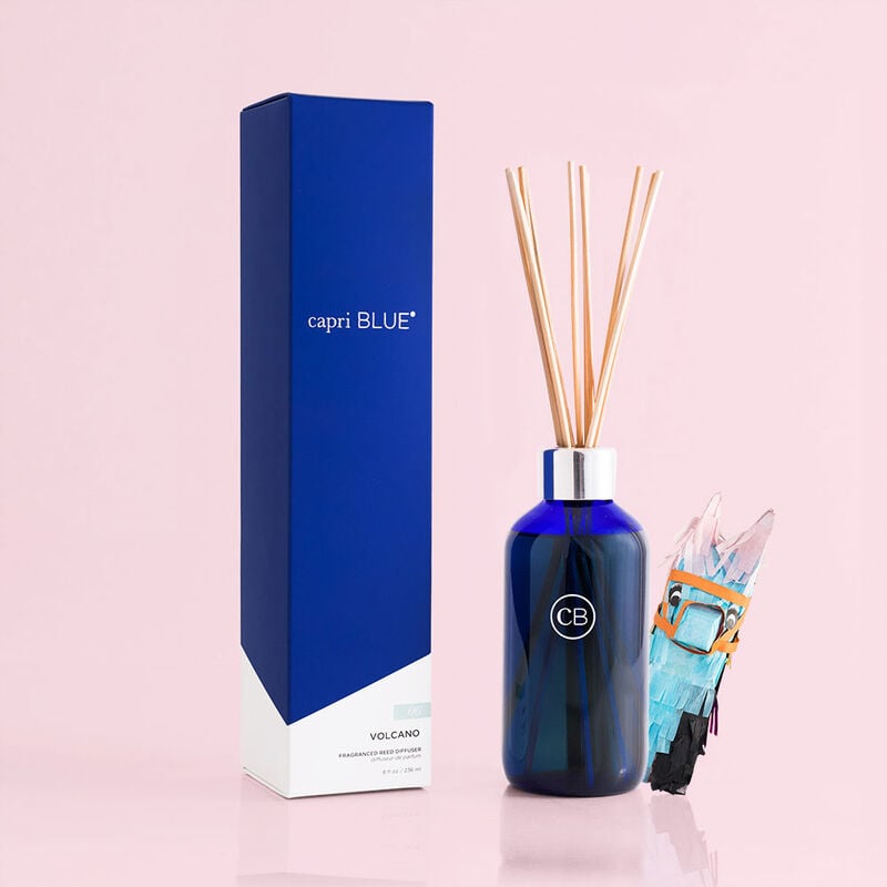 Volcano Signature Reed Diffuser in a clear glass vase with reeds