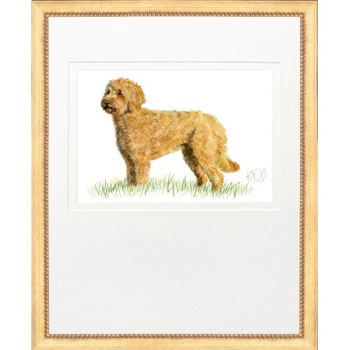 Framed watercolor painting of a golden hunting dog standing in grass within a gold frame.