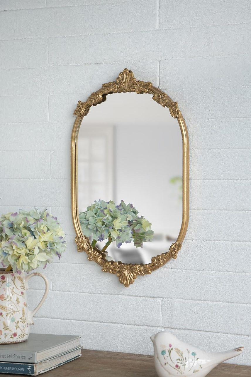 Gold iron frame mirror tray with intricate floral cutout patterns