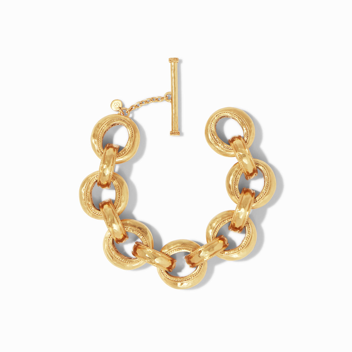 Cannes Demi Link Bracelet in 24K gold plate with hammered links and a toggle closure.