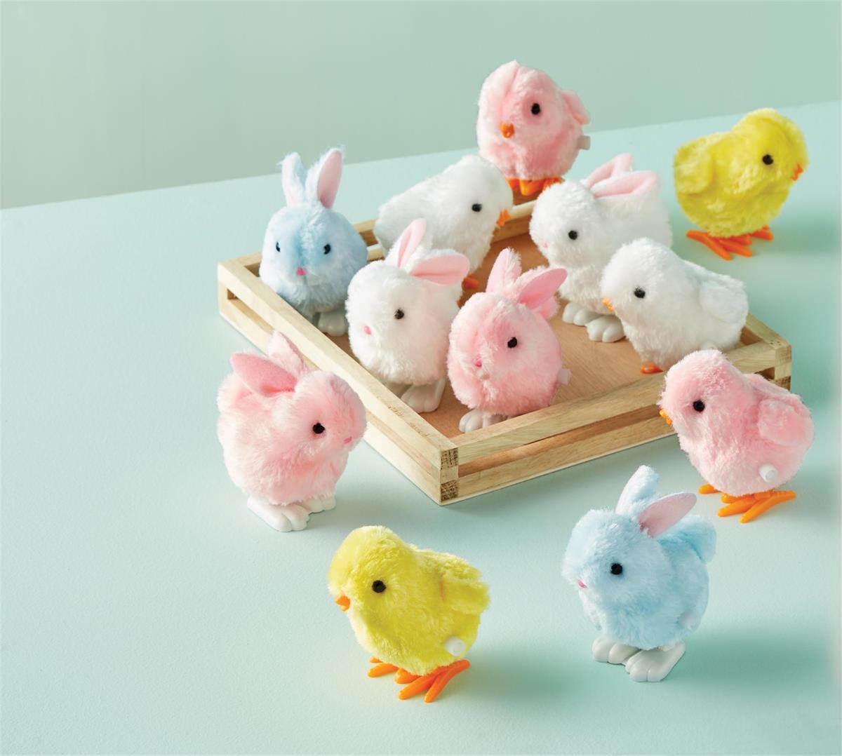 Wind Up Chicks And Bunnies toy featuring a chick with yellow feathers and bunny ears in bright colors.