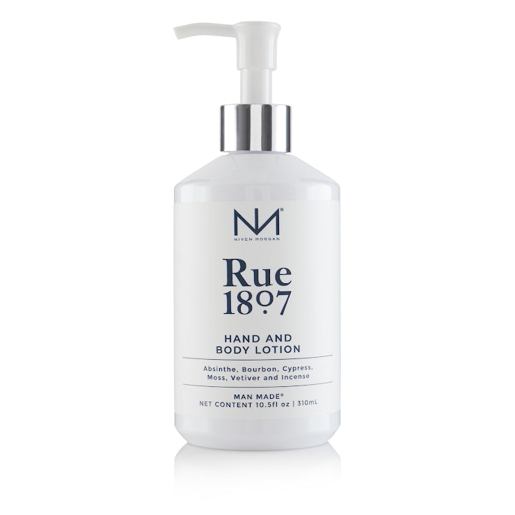 Rue 1807 Hand and Body Lotion in a white pump bottle with silver collar and navy blue text.