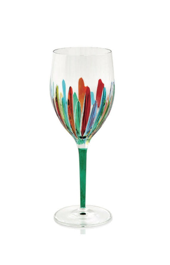 Clear wine glass with a green stem and colorful abstract paint strokes around the bowl.