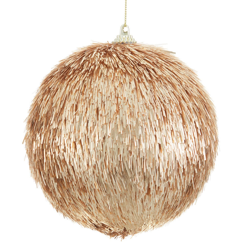 Gold tinsel ball ornament made of plastic, styrofoam, and glitter.