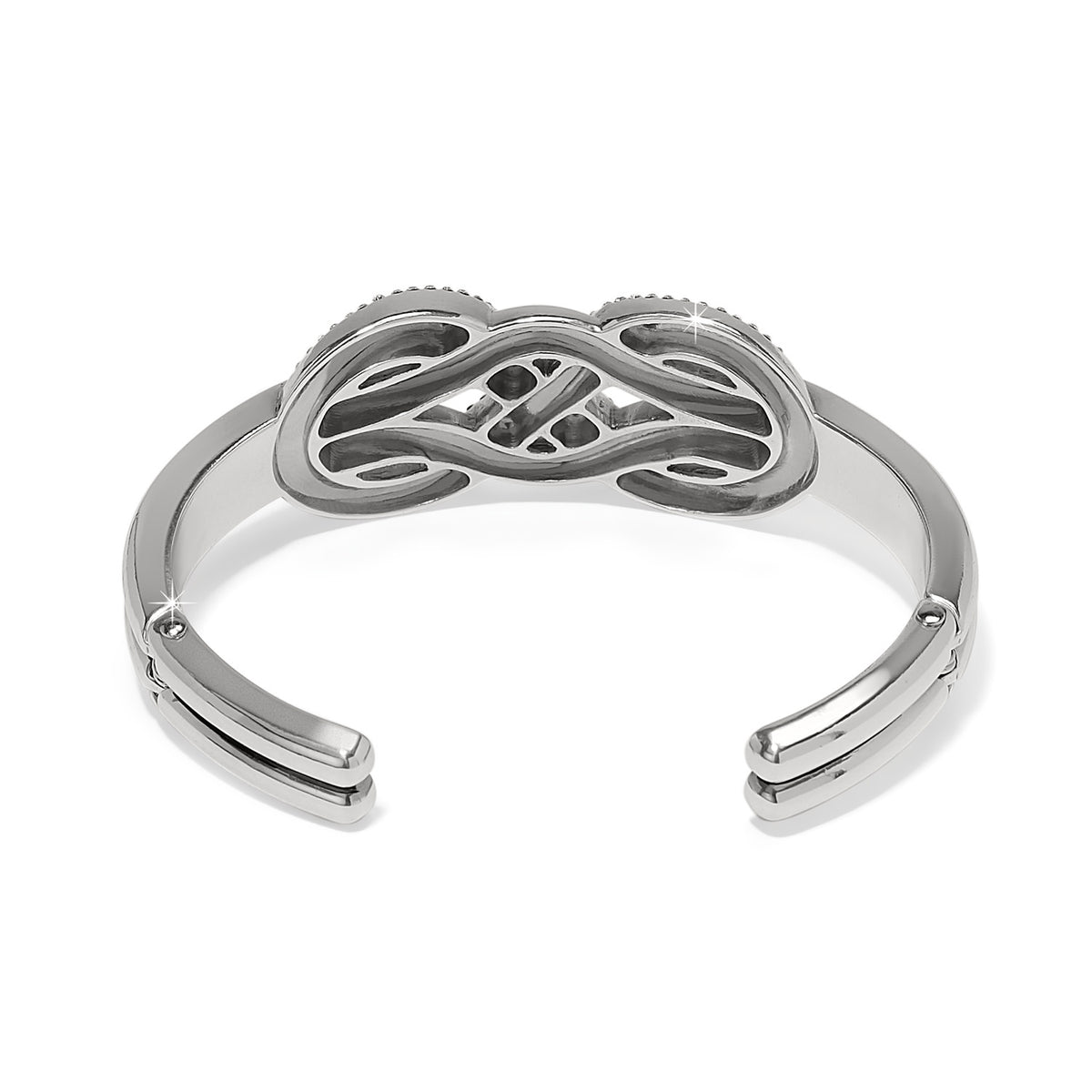 Back view of a silver-plated Interlok Luxe double hinged bangle with intricate knot design.