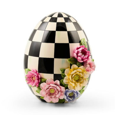 Resin tabletop egg with a frolic spring floral pattern in pastel colors.