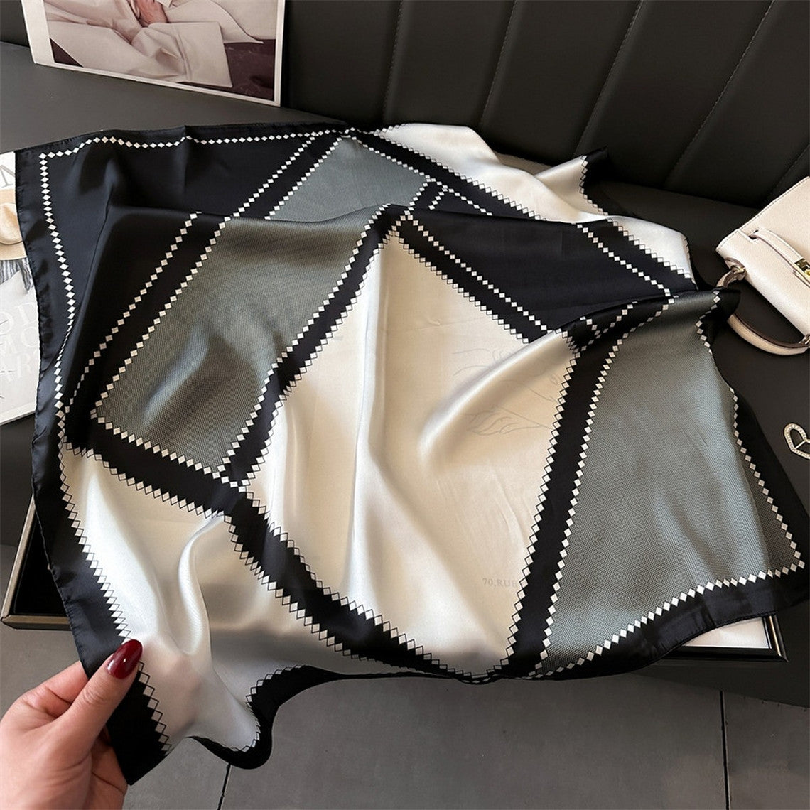 70cm square silk-like scarf with a black, white, and grey geometric diamond pattern.