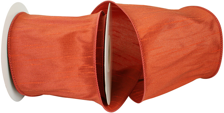 4-inch orange Dupioni Supreme wired edge ribbon on a white spool.