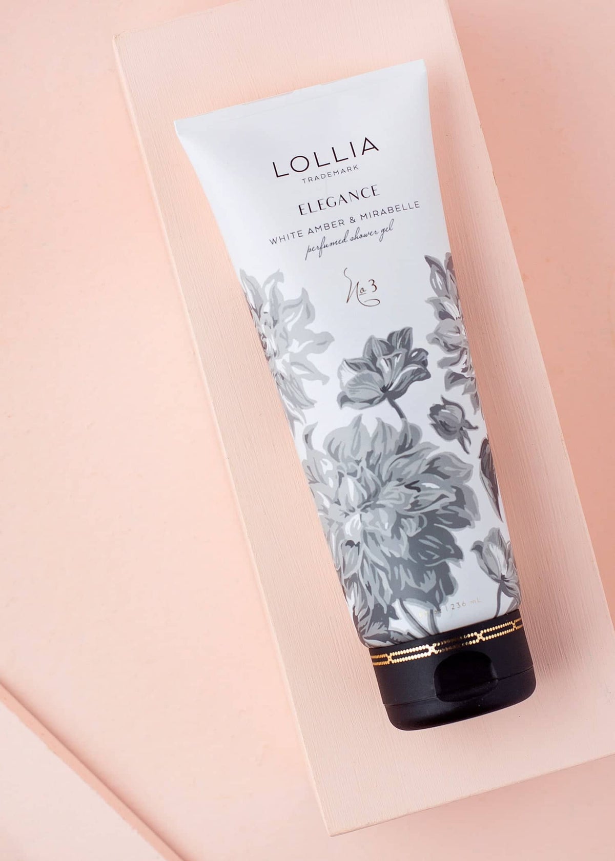 Satin-touch tube shower gel with meandering floral wrap and metallic detailing