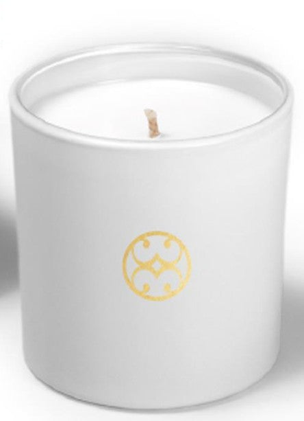 Glass jar candle with vanilla spice ginger scent featuring a neutral beige wax surface.