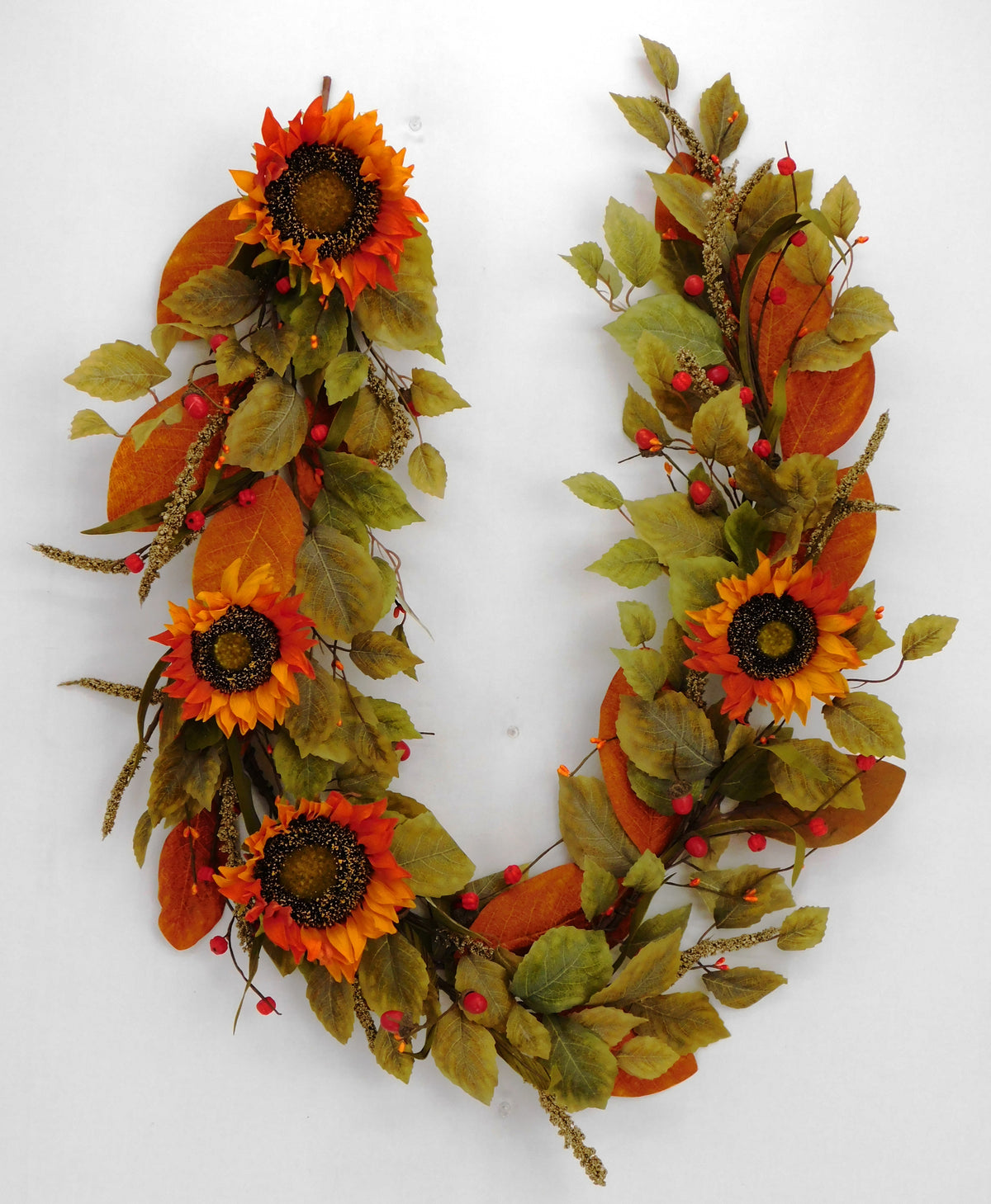 Five-foot artificial sunflower garland with green foliage stems.