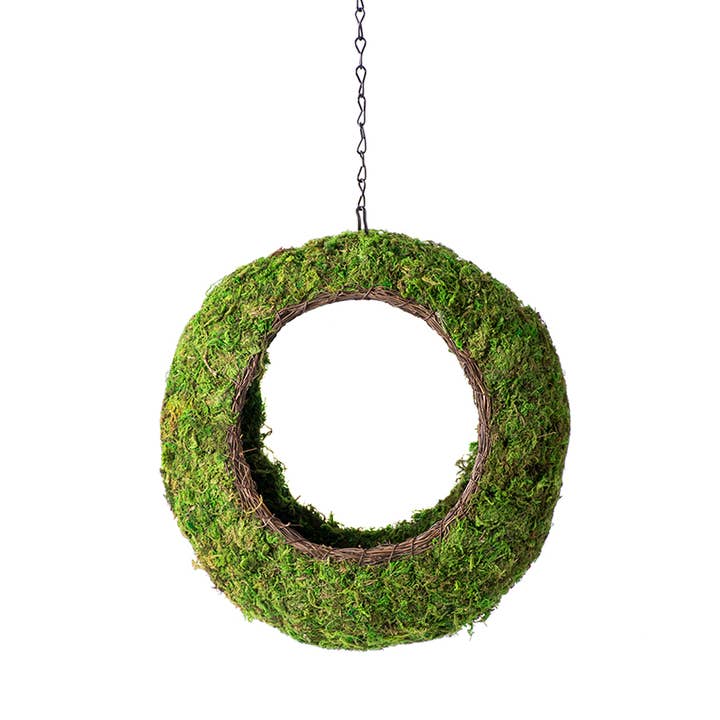 Ceramic bird feeder planter with a natural finish.