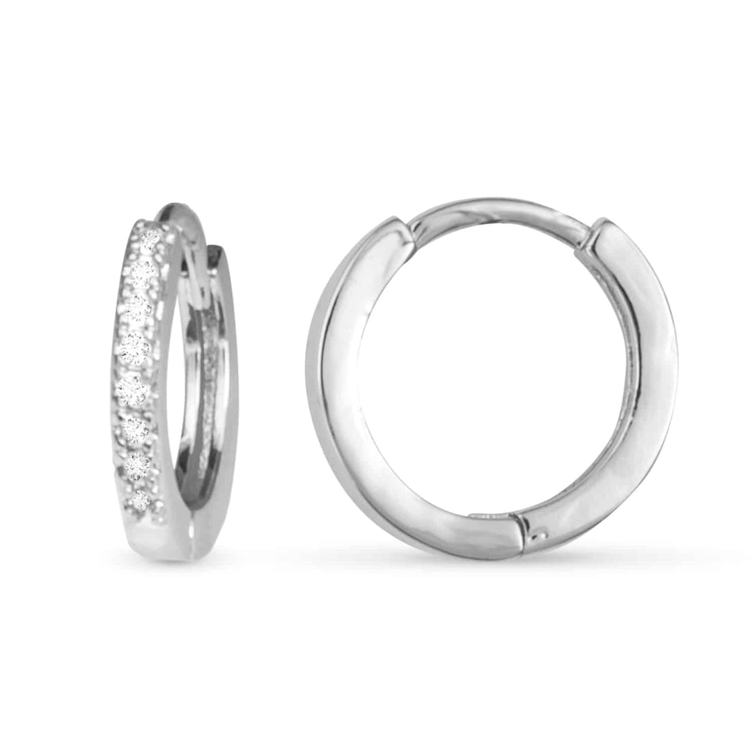 A pair of silver hoop earrings, one showing a front view with CZ stones and one side view.