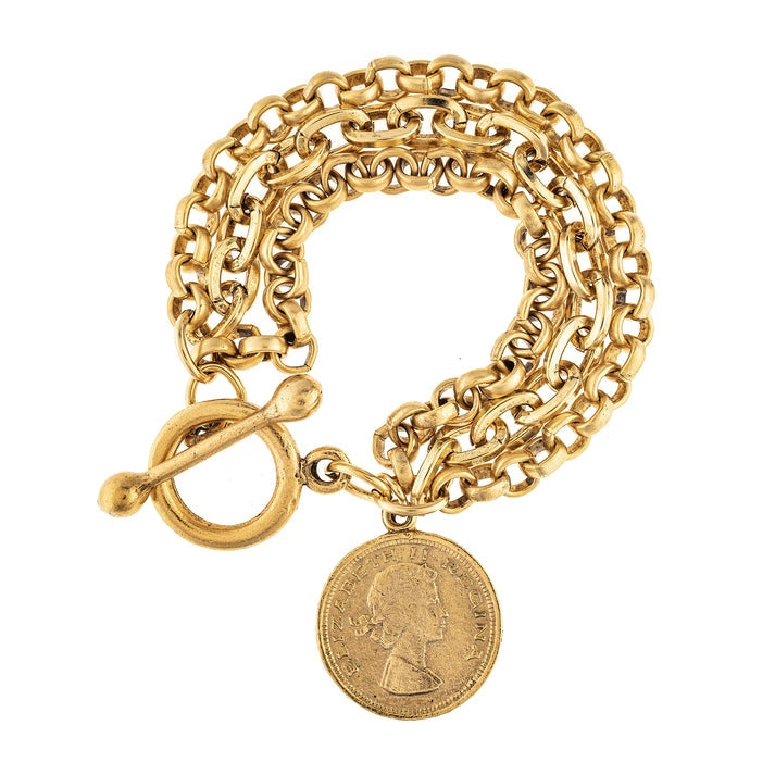 Lance Gold Chain Bracelet featuring layered gold-tone chains, a coin charm, and a toggle clasp.