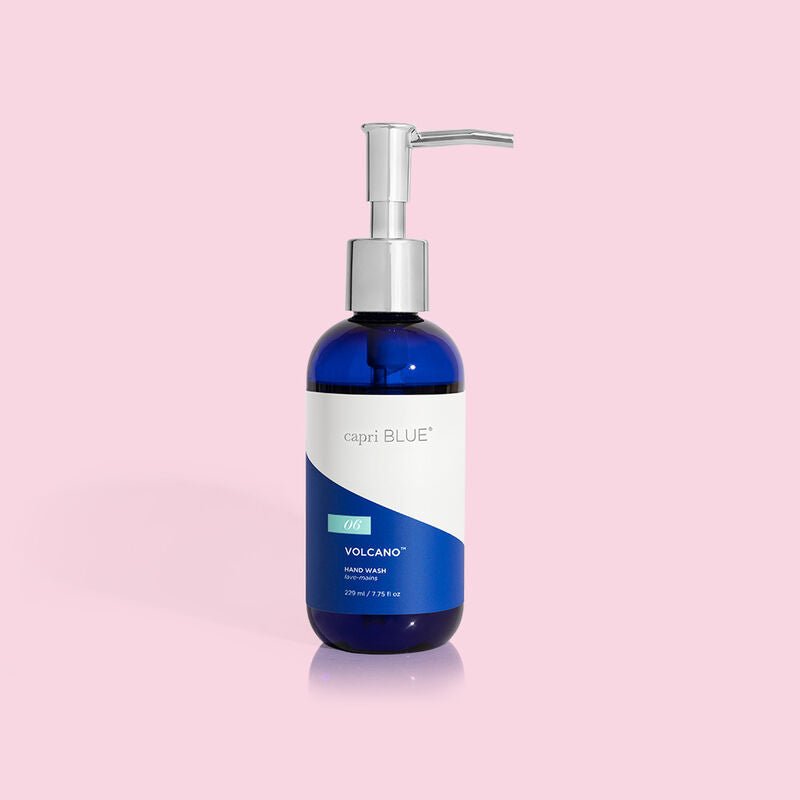 Bottle of Volcano hand wash in a clear container with white liquid.