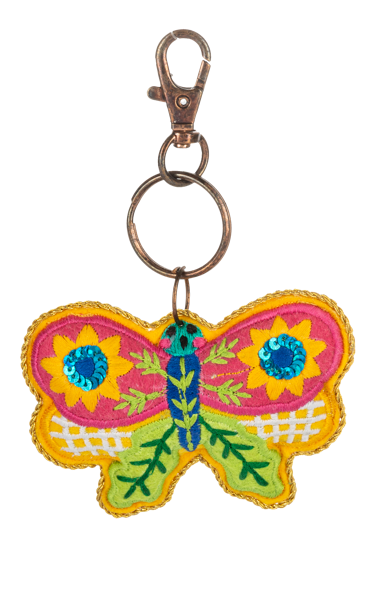 Multi-colored butterfly purse charm with embroidered wings and delicate beaded accents.