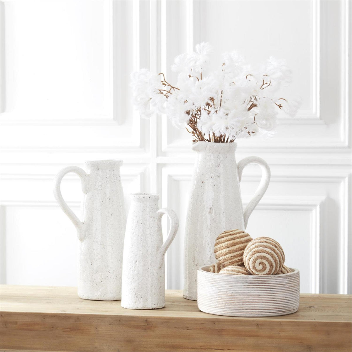 White ceramic pitcher with crackled glaze finish