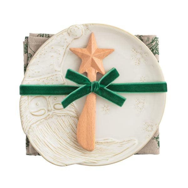White Christmas appetizer plate set with Santa Claus illustration on milk glazed stoneware.
