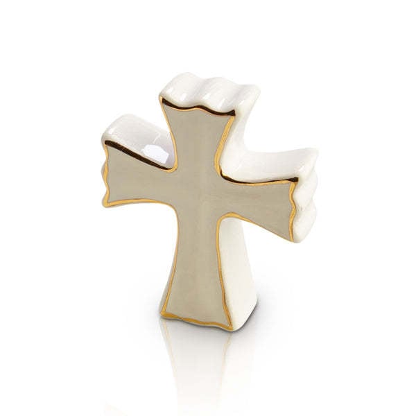 White cross-shaped pendant on a delicate chain