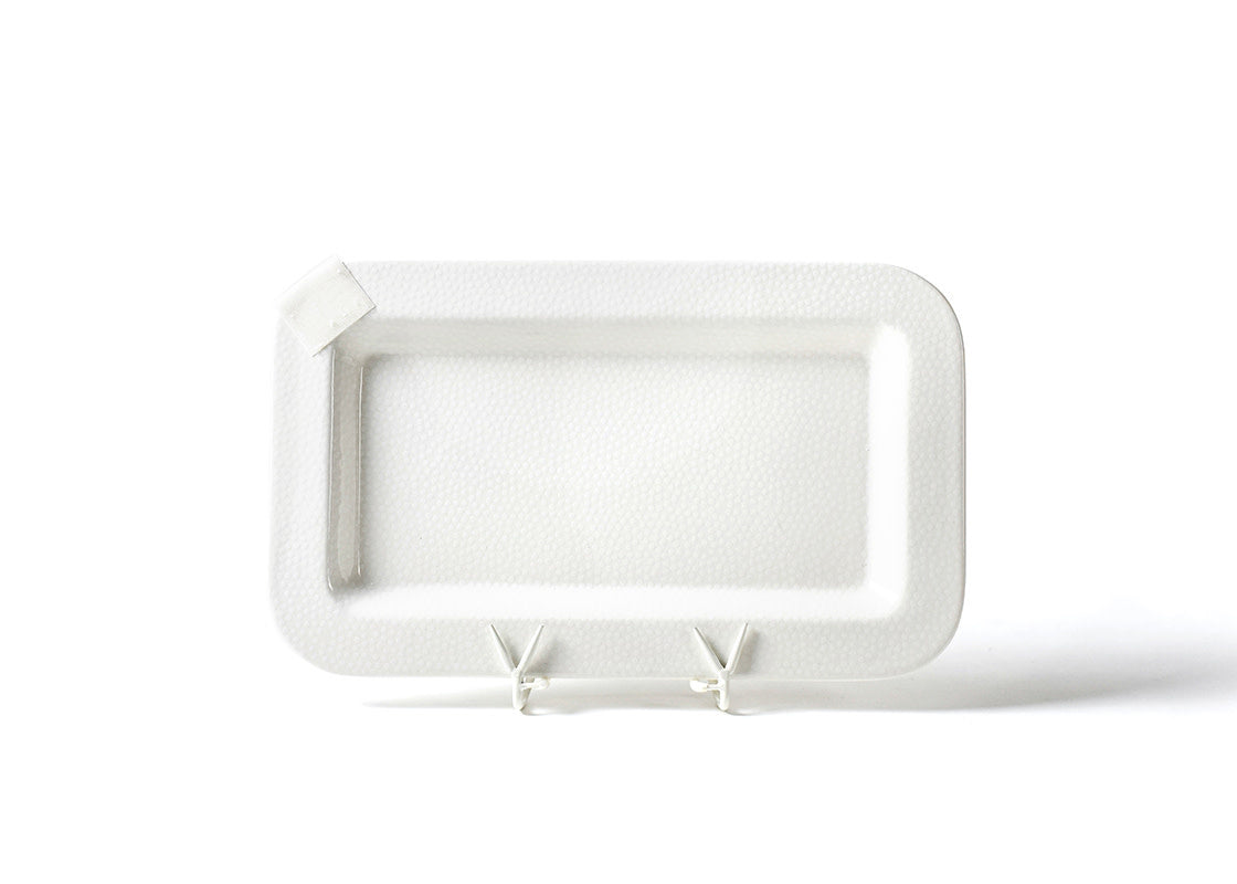 White ceramic rectangular serving platter with small dot pattern