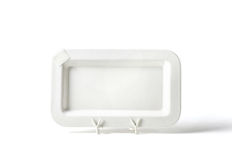 White ceramic rectangular serving platter with small dot pattern