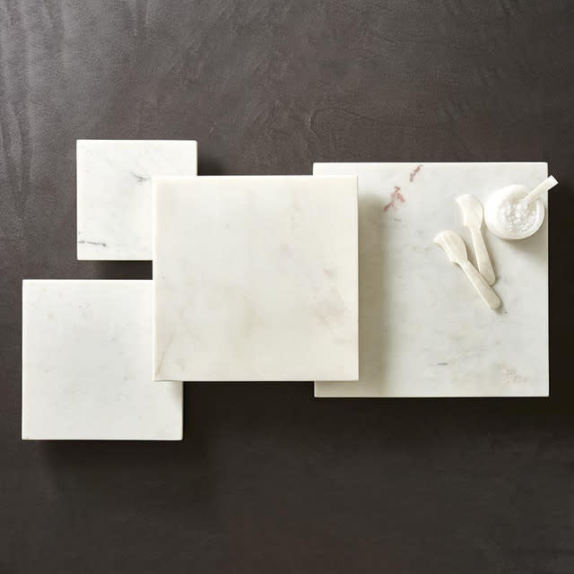 White marble footed tray with natural veining and square shape