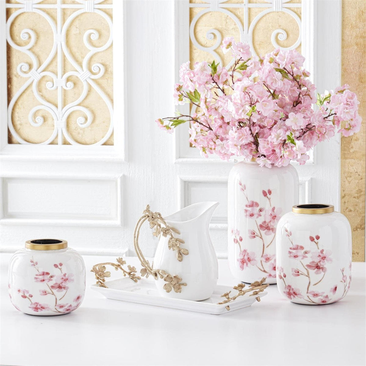 White enameled iron vase with pink cherry blossom floral pattern and gold rim