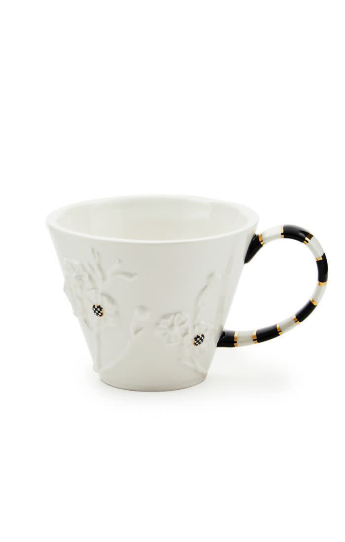 White dolomite ceramic mug with a rounded handle and smooth matte finish.