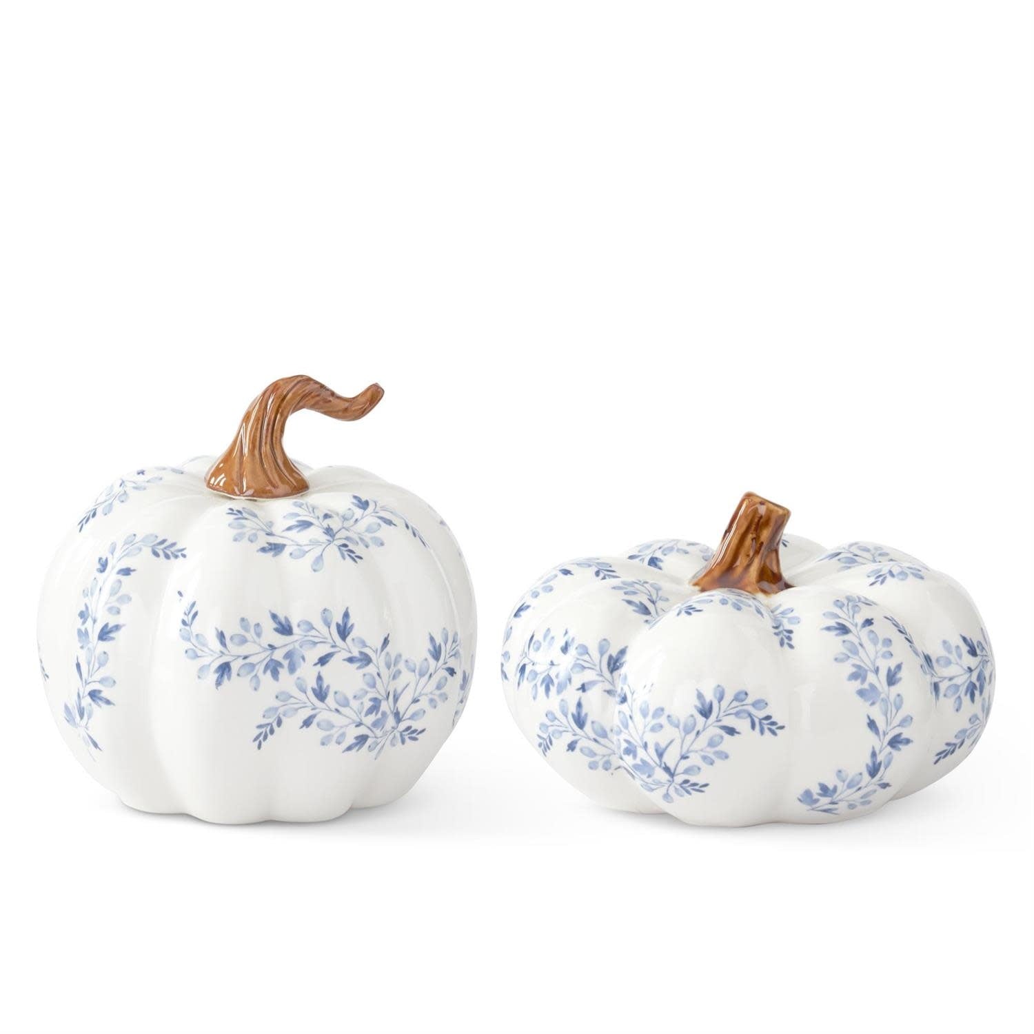 White ceramic pumpkin with blue floral pattern on a neutral background