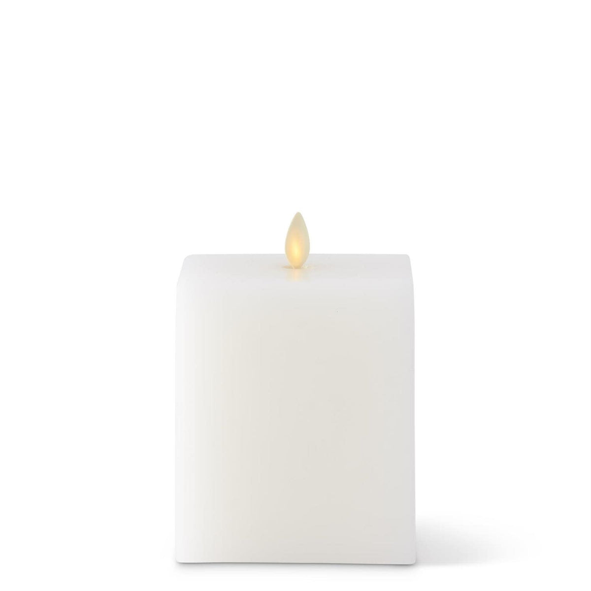 Large white square Luminara flameless candle with soft flicker effect.