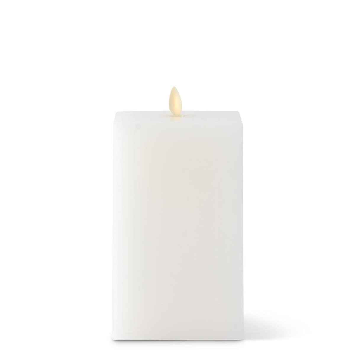 Large white square Luminara flameless candle with soft flickering light effect.
