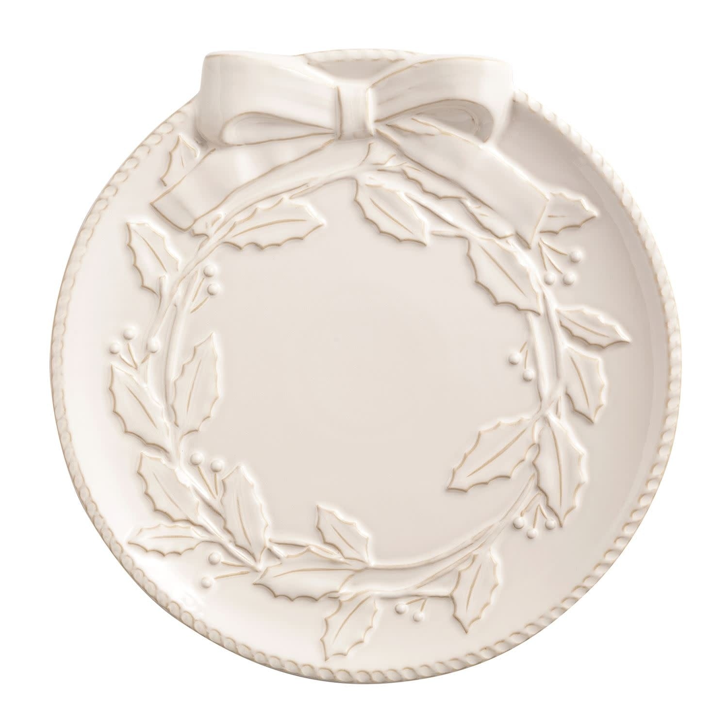 White milk glazed stoneware platter with textured relief and wooden serving tongs.