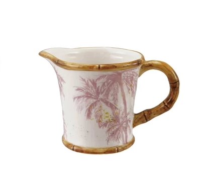 Hand-painted stoneware creamer with bamboo-style edges in a natural earth tone.